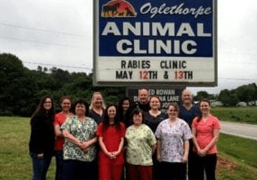 Animal clinic staff posing outdoors